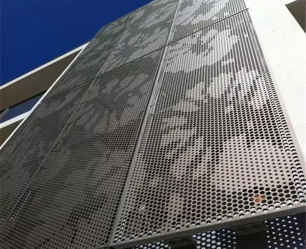 Perforated metal screen facade for thermal insulation