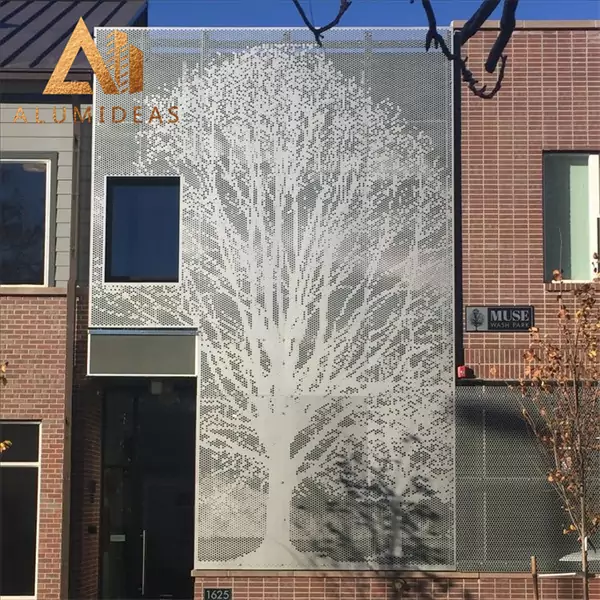 Perforated aluminum facade with tree design